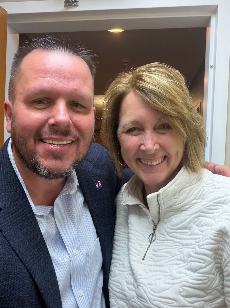 Clean Christian comedian Jody Fuller smiling with a guest at Panama Methodist Church’s 200th Anniversary Celebration in Panama, New York